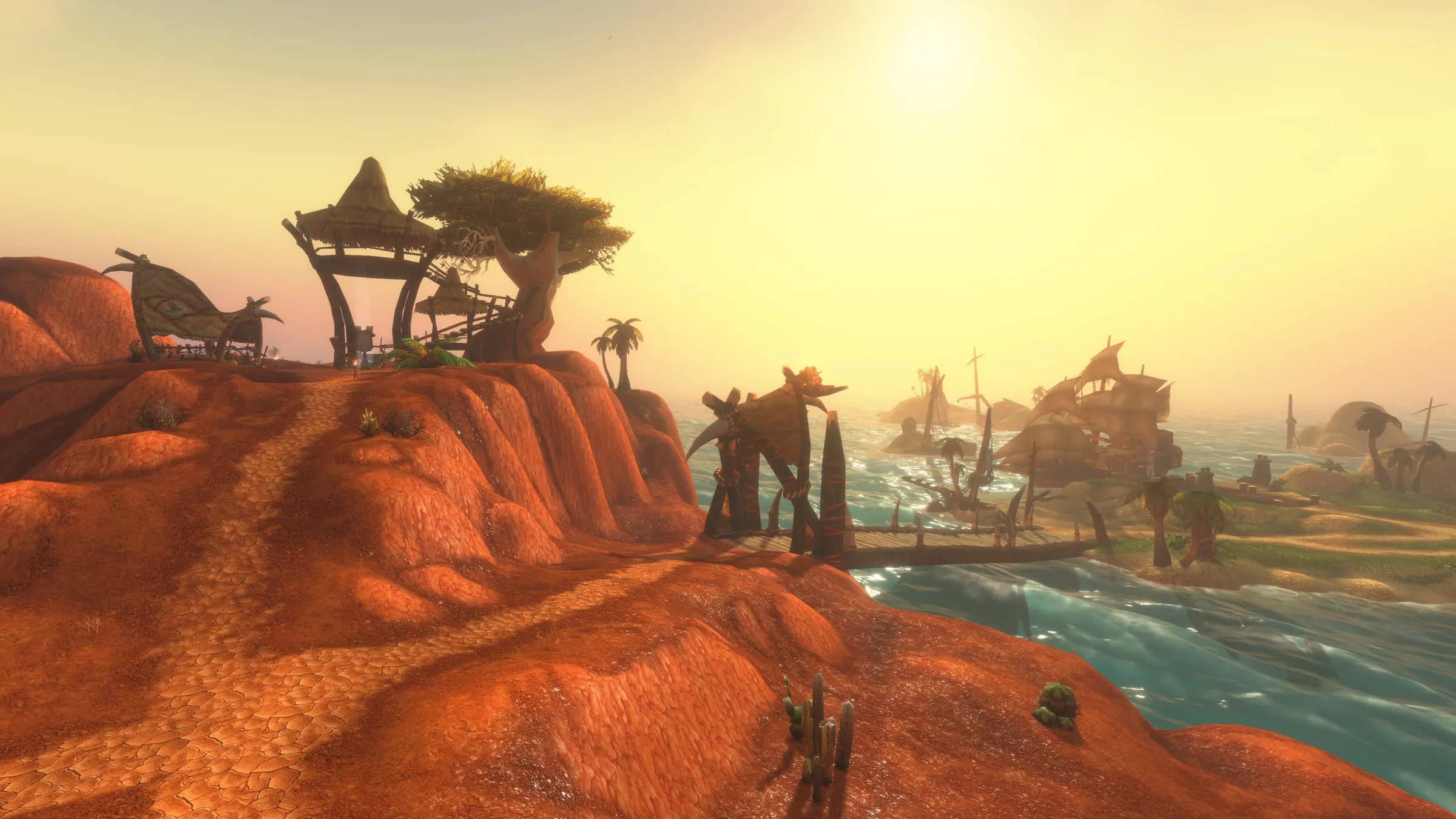 Thatched huts on red rock above the water in the Darkspear Islands