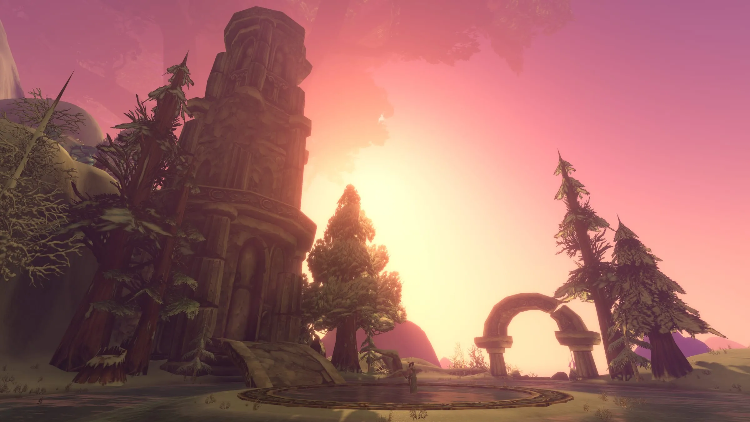 A ruined tower and standing stone arches on Mount Hyjal under a burning pink sky